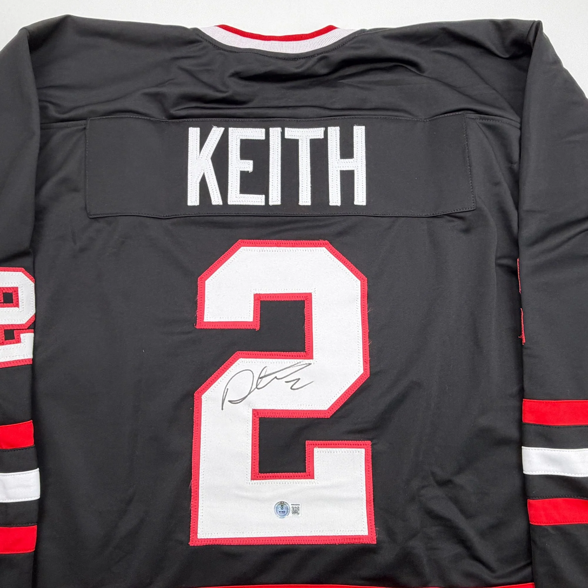 Autographed/Signed Duncan Keith Chicago Black Hockey Jersey Beckett BAS COA - Image 2